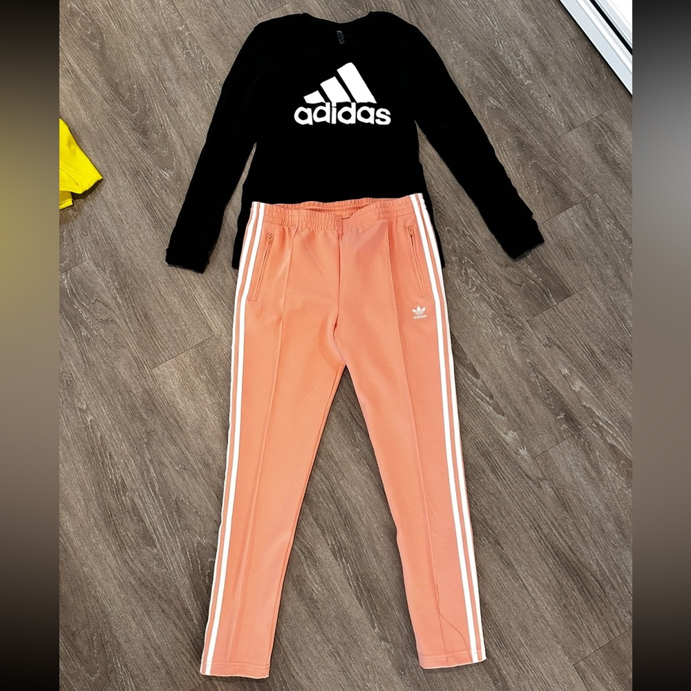 Women’s Med Adidas track suit. Lot 22